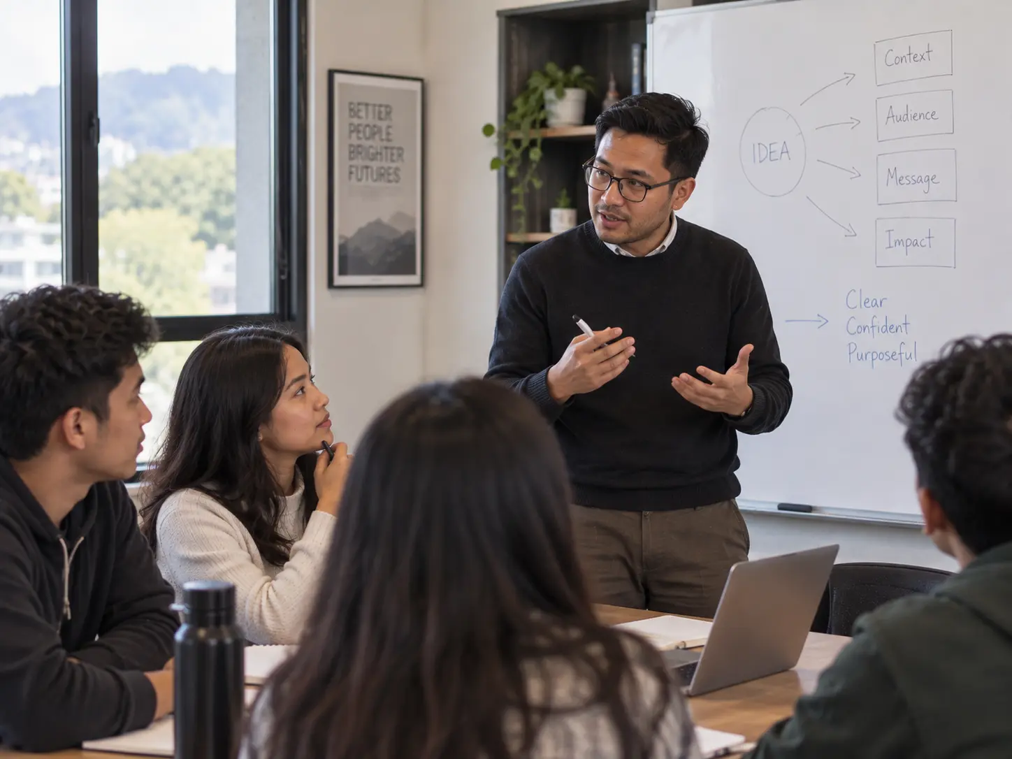 Educator explaining a concept to learners during a classroom communication session